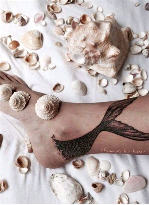 mermaids and tropical tattoos blog🌊🐚🐠🐙🐟🐠🐳🐬 mermaid tattoo tattoo blog tropical tattoo