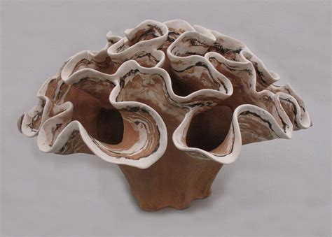 Coral Buquet Elizabeth Shriver Working With Clay To Create A Series Of