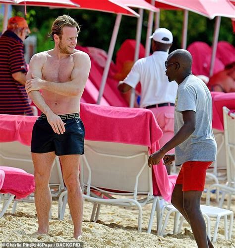 Olly Murs And Fiancee Amelia Tank Stunned Enjoying A Pda Filled Beach Day In Barbados S Chronicles