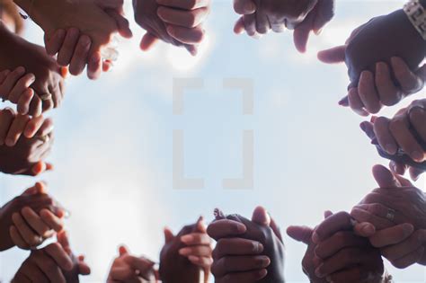 Group Holding Hands In A Prayer Circle — Photo — Lightstock