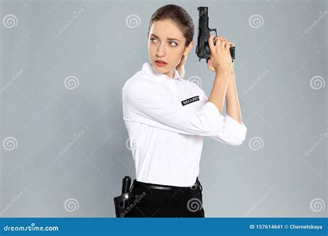 Female Security Guard In Uniform With Gun Stock Image Image Of Person