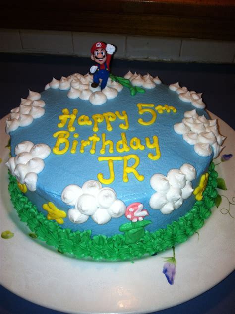 For mackenzie's birthday coming up lol. Super Mario cake. Buttercream only! Used the viva paper towel method to smooth out the ...