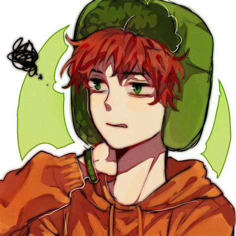 A Man With Red Hair Wearing A Green Hat And An Orange Hoodie Is Staring