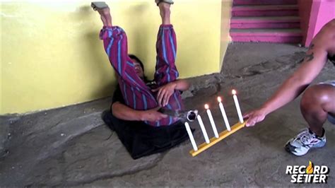 Filipino Man Sets World Record For Most Lit Candles Extinguished By Farting