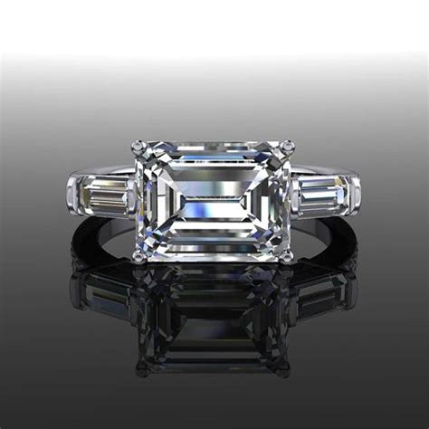 A Diamond And Moissanite East West Engagement Ring In 14 Kt White Gold