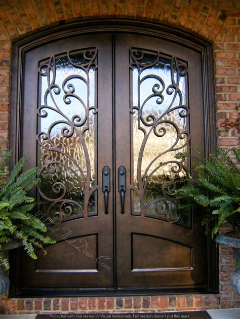 Double front doors are used in many storefronts, which makes people think of being welcomed. Oklahoma Wrought Iron Entry Front Doors | Universal Iron Doors
