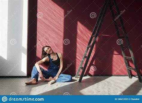 Warm Sunlight Goes Through The Windows Young Housewife Decided To Glue Wallpaper In Her New