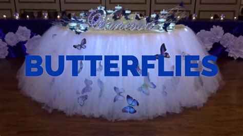 blue butterfly themed floating candle lighting ceremony and tutu fairy skirt by sweet 16