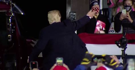 Video Shows Trump Tossing Hats To Crowd Before Positive Test For Virus