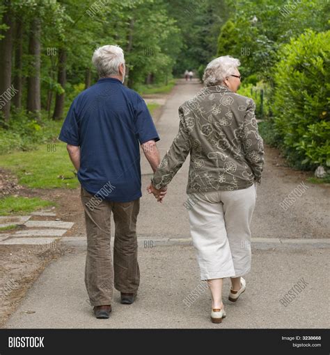 Elderly Couple Walking Image And Photo Free Trial Bigstock