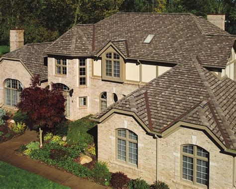 It's crafted from a mix of solid and engineered wood in a light brown and espresso hue that blends in easily with any color palette. GAF Camelot Aged Oak See more options at http ...