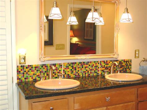 A new bathroom backsplash tile design can transform even the dingiest of rooms. Colorful mosaic backsplash