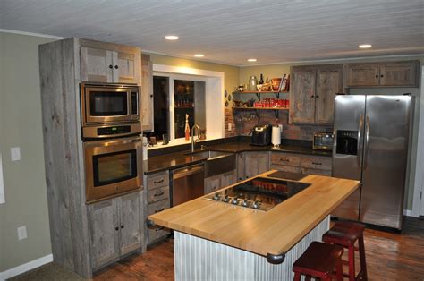 If you are thinking about wooden kitchen it is especially great for kitchen cabinets because is holds very well when it comes to moisture. Weathered Gray Barn Wood Kitchen — Barn Wood Furniture ...