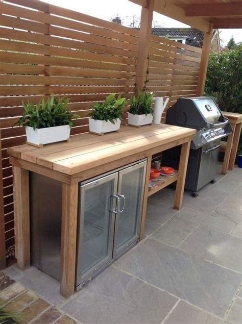 Outdoor Kitchen Ideas Wooden Table With Fridge And Barbecue Grill Three
