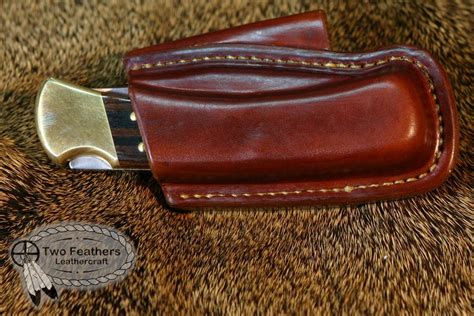 Maybe you would like to learn more about one of these? Folding Knife Horizontal Belt Sheath by Two Feathers ...