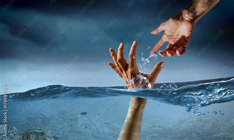 Hand Of Person Drowning In Water Stock Photo Adobe Stock