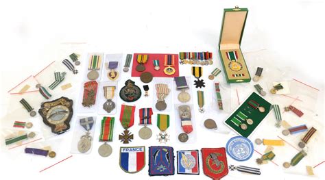 Lot 41 A Collection Of Miniature Medals And Insignia