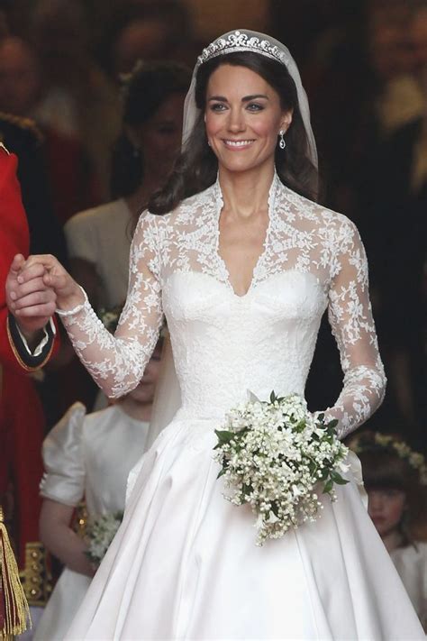 Kate middleton changed into a second wedding dress before the royal wedding reception at buckingham palace! Meghan Markle and Kate Middleton wedding dresses: The ...