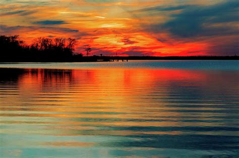 Gorgeous Sunset With Beautiful Vibrant Colors On The Lake Photograph By