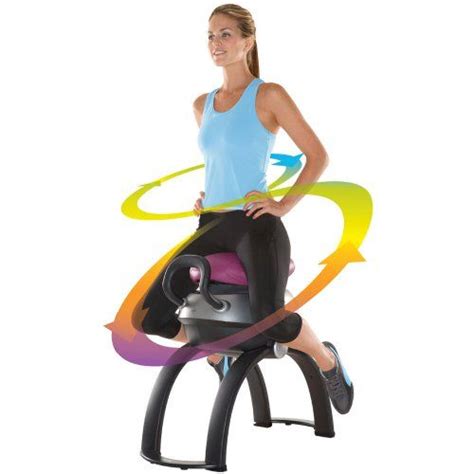 A Woman Standing On An Exercise Bike With Colorful Swirls Around Her