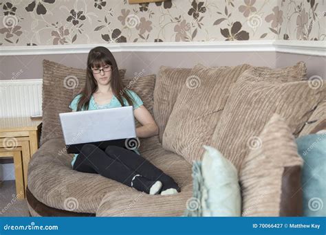 Chilling On Sofa Using A Laptop Stock Image Image Of Lifestyles