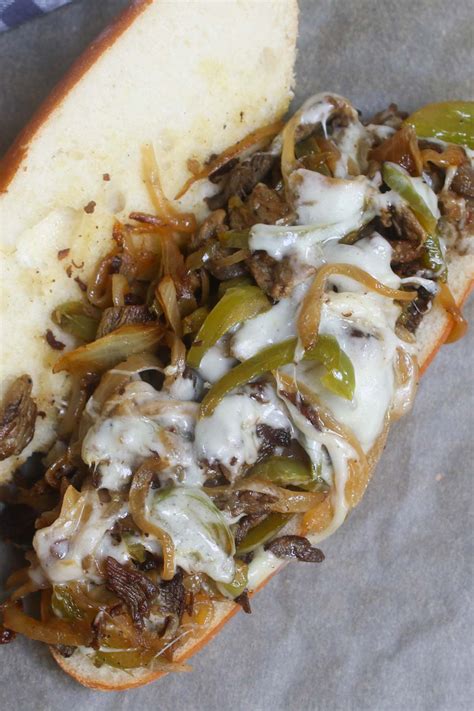 Cut steak diagonally across the grain into thin slices, and serve with sauce. Philly cheesesteak recipe is made with thinly sliced rib-eye beef and sautéed onions, topped ...