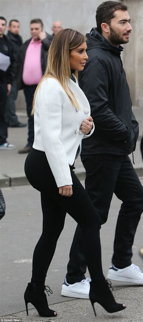 Kim Kardashian Wears White Jacket To Take Museum Tour With Azzedine