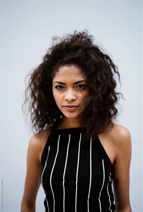 Mixed Race Young Woman With Curly Hair Stocksy United
