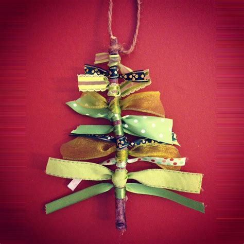 So, just in cased you missed. DIY Christmas tree ornament made with ribbons and a twig ...