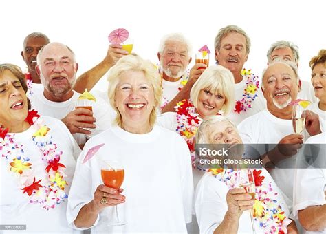 Elderly People At A Hawaiian Beach Party Stock Photo Download Image