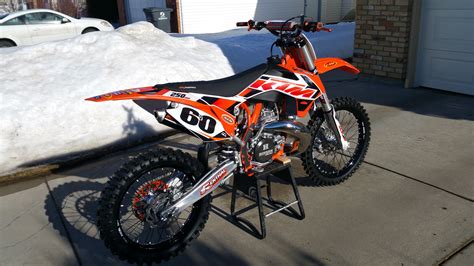 With the help of nekken handlbars, tusk wheels, tm designs, factory effex, scalvini exhaust, and esr suspension they were able to build a fire breathing 250 2 stroker. 2015 KTM 250 SX - nielsd60's Bike Check - Vital MX