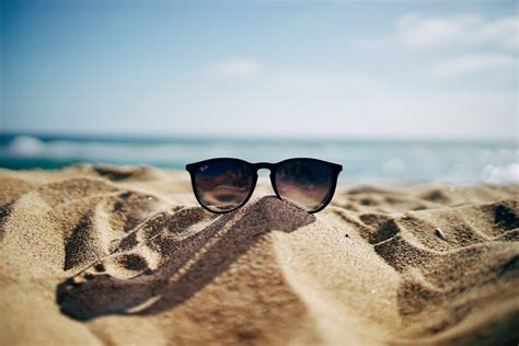 Black Ray Ban Wayfarer Sunglasses On Beach Sand Photo Free Summer