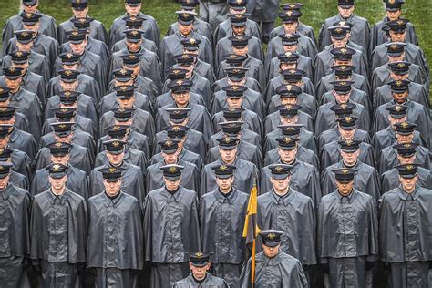 Cadets From The United States Military Academy March Onto The Field
