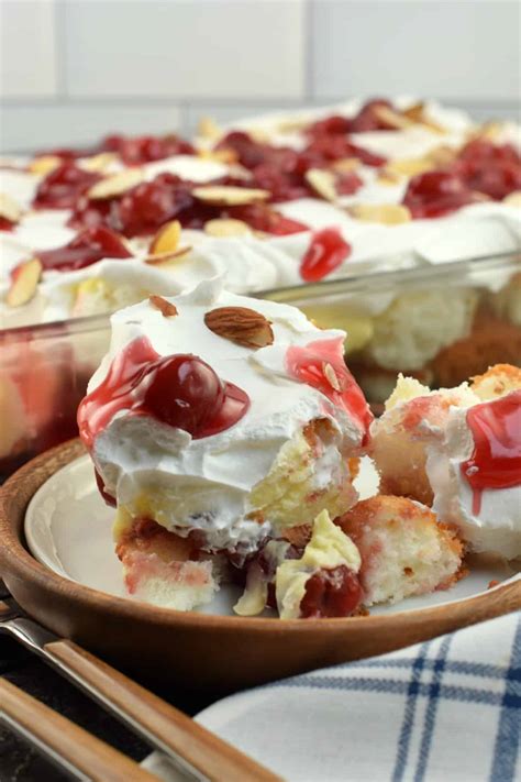 In a 9×13 baking dish, arrange 1/2 of cake cubes in a layer. Heaven on Earth Cake Recipe {Angel Food Dessert}