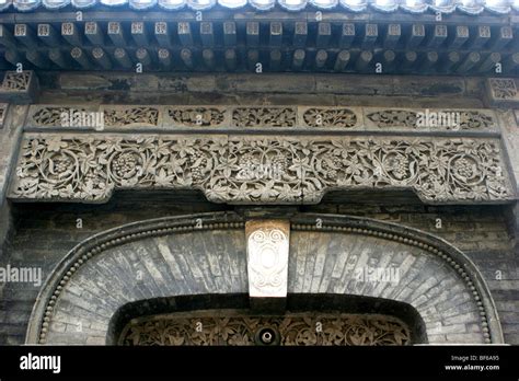 Exquisite Brick Carvings On The Gate Of A Hutong Mansion Beijing