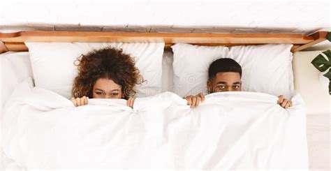 Funny Couple Hiding Under White Blanket In Bed Stock Image Image Of Lifestyle Girlfriend
