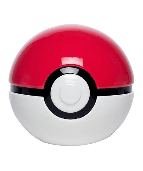 A Red And White Pokeball Sitting On Top Of A Table