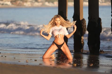 Khloe Terae Joins The No Bra Club As She Poses In A Wet T Shirt On The Beach Photos