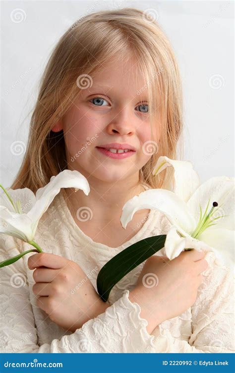 Girl And Lilies Royalty Free Stock Photography 2221043