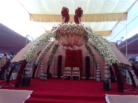 Amazing floral pillar stage decor. about marriage: marriage decoration photos 2013 | marriage ...