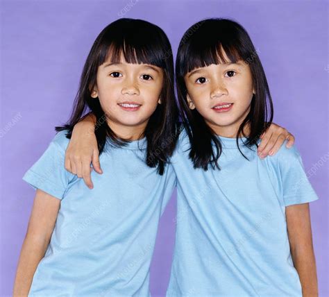 Identical Twin Sisters Stock Image P9000103 Science Photo Library