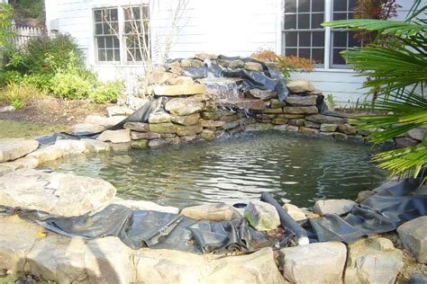 Installing pond liner seems like a simple task but let me assure you we have a couple tips and tricks we think you will find useful. Koi Pond Liners | BloggerLuv.com