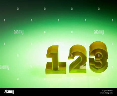 Plastic Numbers 123 On Green Background Stock Photo Alamy