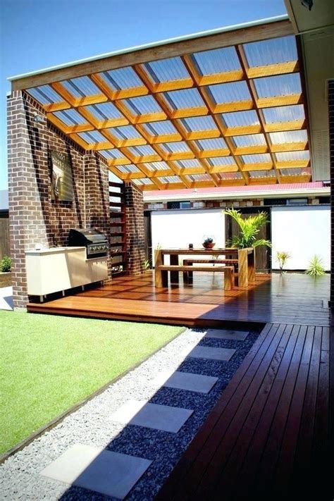 To clean solar panels on outdoor lights, use soapy water and a sponge. PERGOLA WITH CLEAR SOLAR PANEL ROOF ON WOOD SUPPORTS # ...