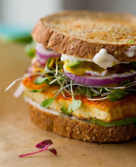 Vegan Lunch Sandwich With Sizzling Skillet Tofu Avocado And Sprouts
