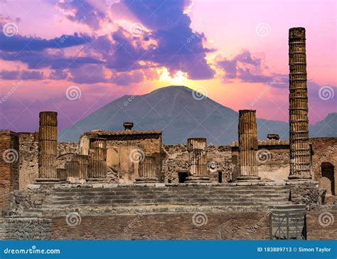 Pompeii And Mount Vesuvius Against A Vibrant Sunset Stock Image Image