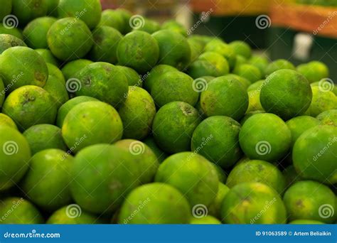 Green Fresh Mandarins On A Local Organic Farm Market Of Tropical Bali