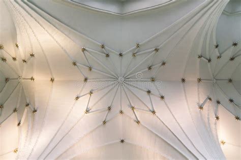 White Vaulted Ceiling Of An Ancient Gothic Catholic Church Stock Photo