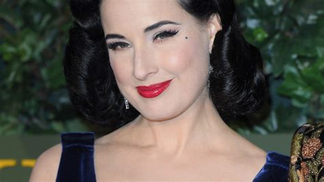 Were Obsessed With This Classy Trick Dita Von Teese Uses To Hide Her Tv Hellogiggleshellogiggles