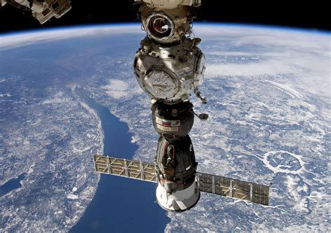 iss crew to inspect soyuz space capsule leak with robotic arm daily sabah